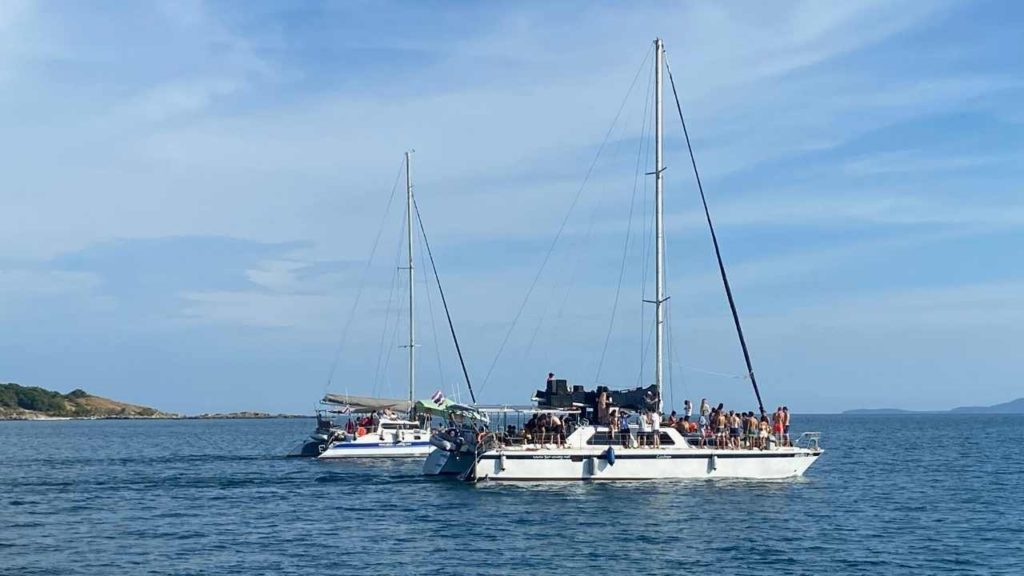 2 Boats Sailing for the sunset party cruise in Phuket