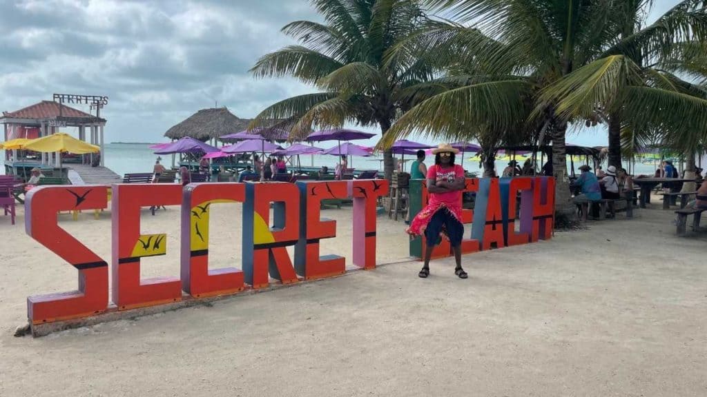 David standing in front of Secret Beach sign.