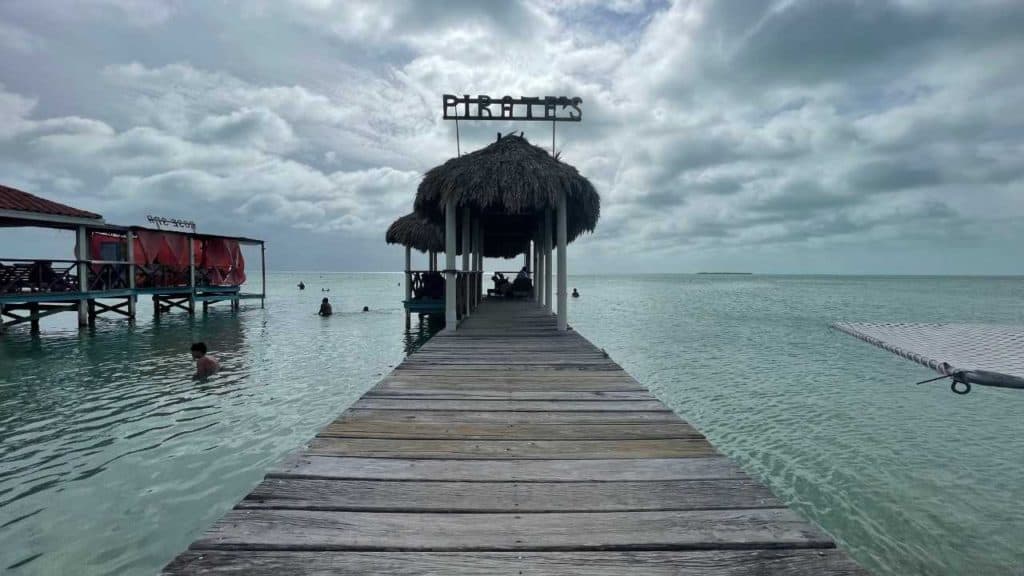 Secret Beach with a view of the pier and the sea.