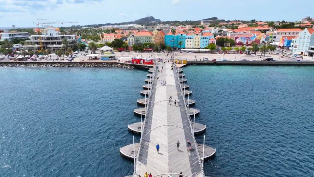 Queen Emma Bridge floating on the water in Willemstad Curacao