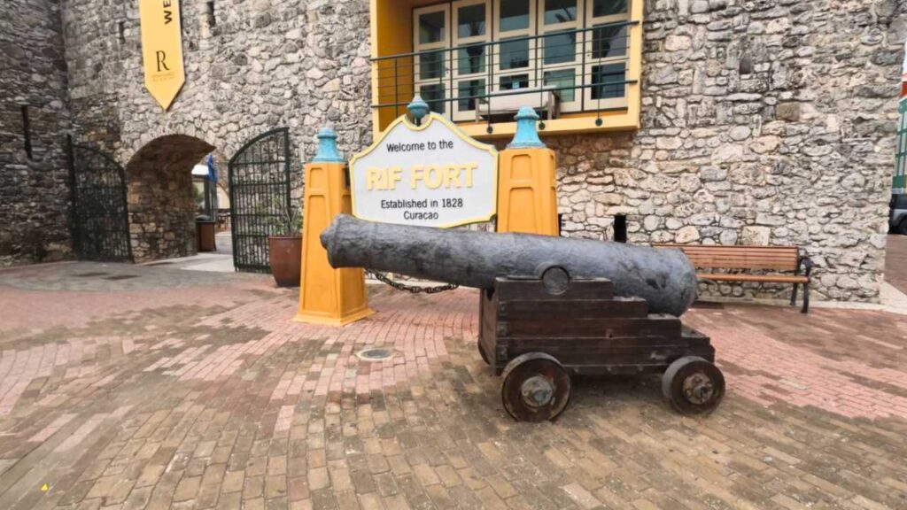 Canon in front of the Rif Fort sign established in 1828