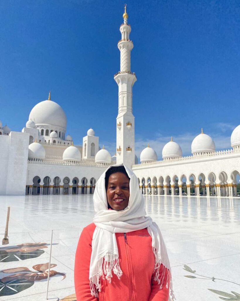 Kendra at the Grand Mosque in Abu Dhabi - a great thing to do in Dubai